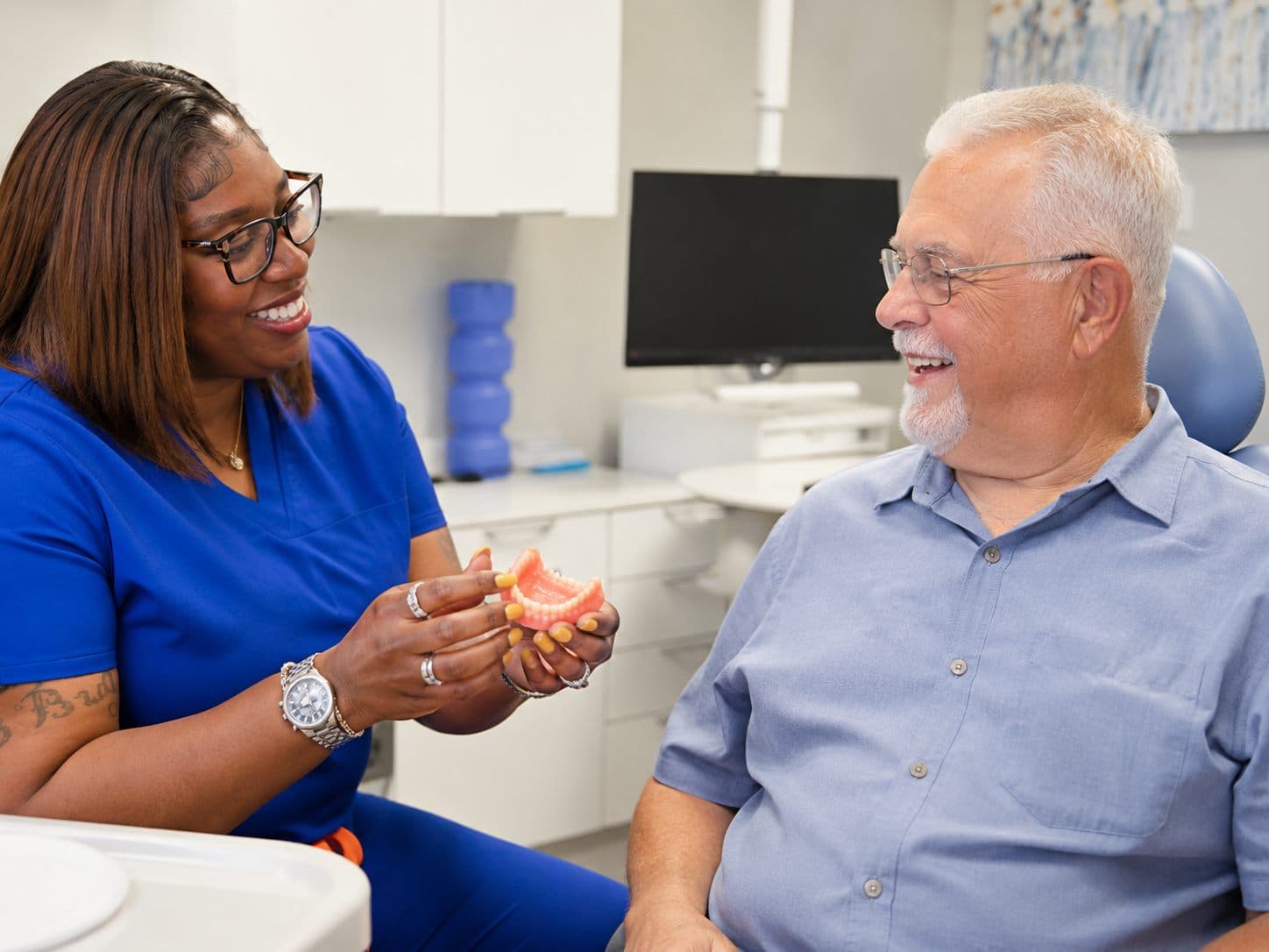 Reviewing a treatment plan at Bright Family Dentistry